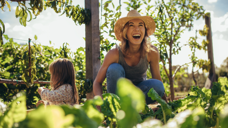 garden pest control -woman and child in garden